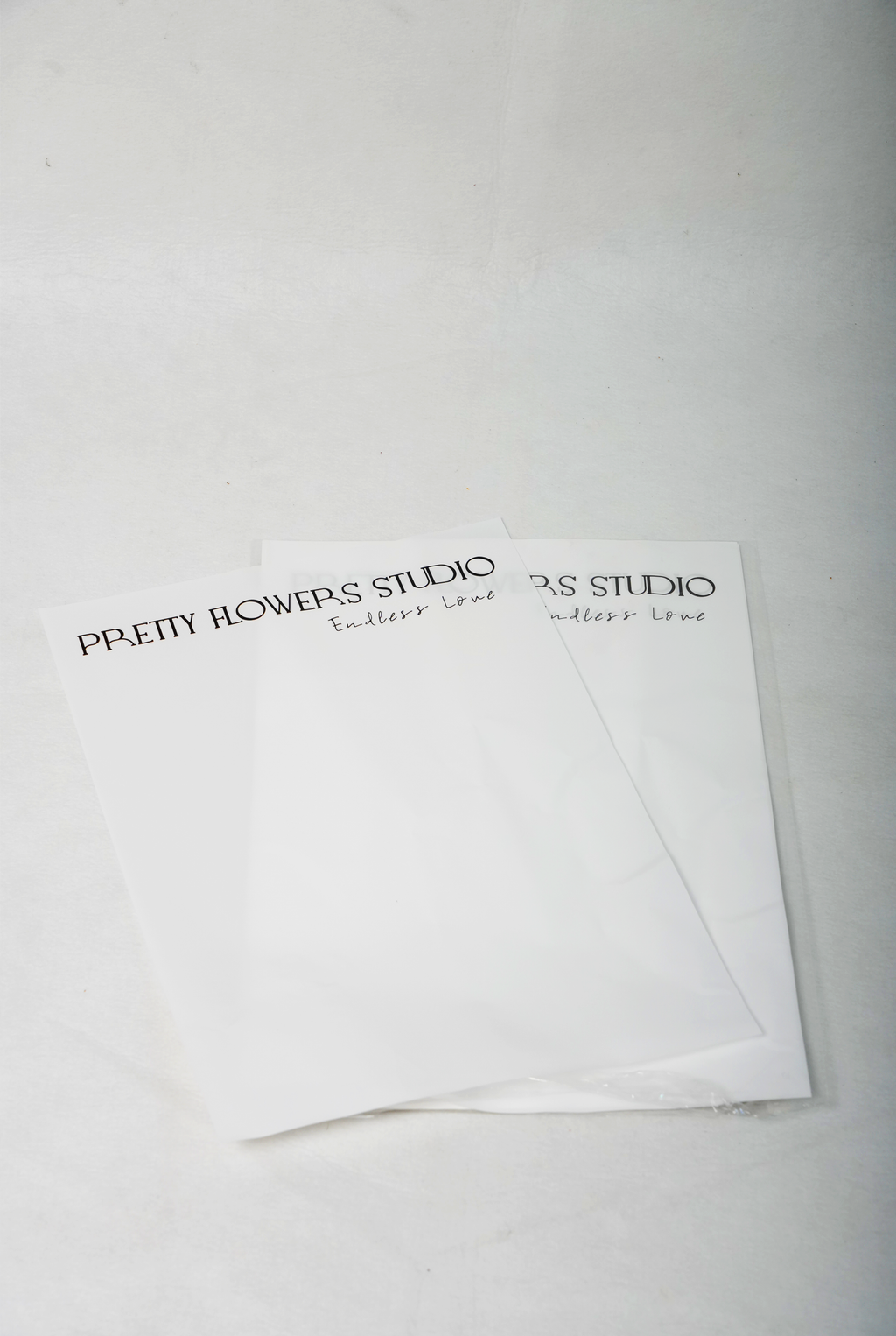 Printed White Flower Bouquet Wrapping Sheets – Minimal Text Design (Set of 10)