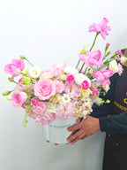 “Blush Whispers Pink Hat Box Bouquet”