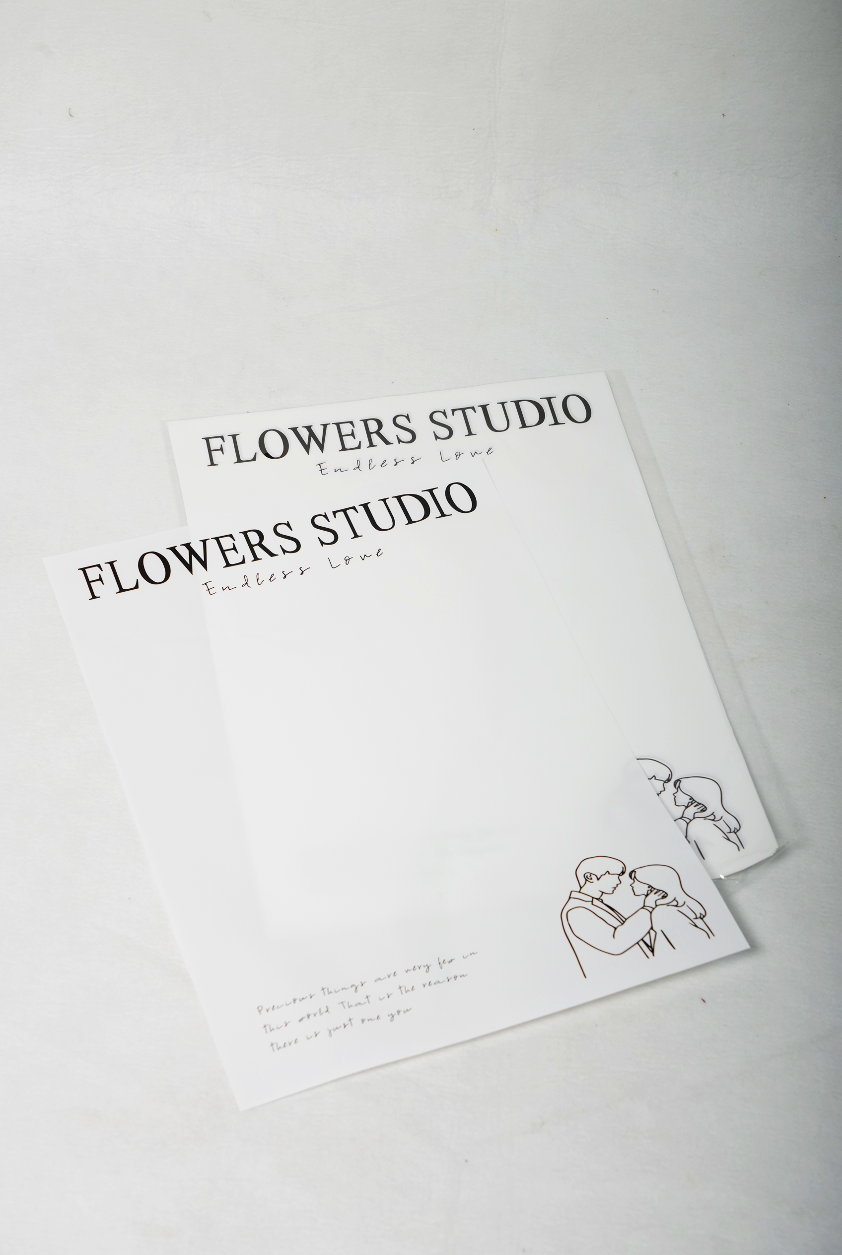 Printed White Flower Bouquet Wrapping Sheets – Minimal Text Design (Set of 10)