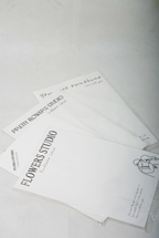 Printed White Flower Bouquet Wrapping Sheets – Minimal Text Design (Set of 10)